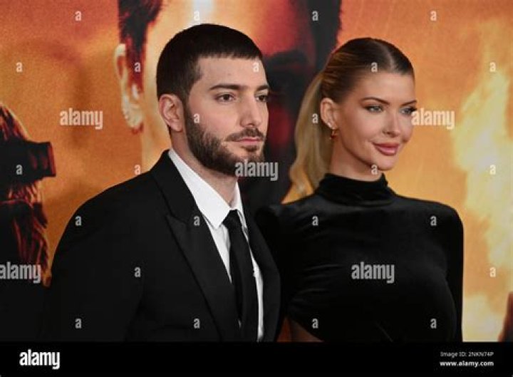 Alesso and Erin Michelle Cummins attend "The Batman" World Premiere on