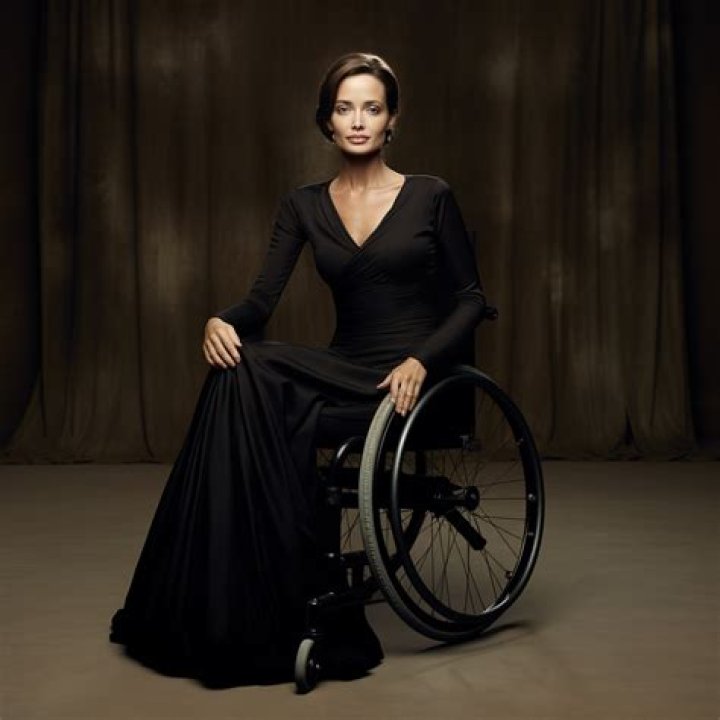 Angelina Jolie first press photo in wheelchair by p323 on DeviantArt