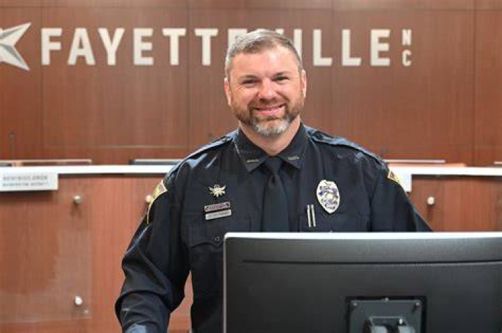 Fayetteville Police Officer Domingo TavarezRodriguez and his wife