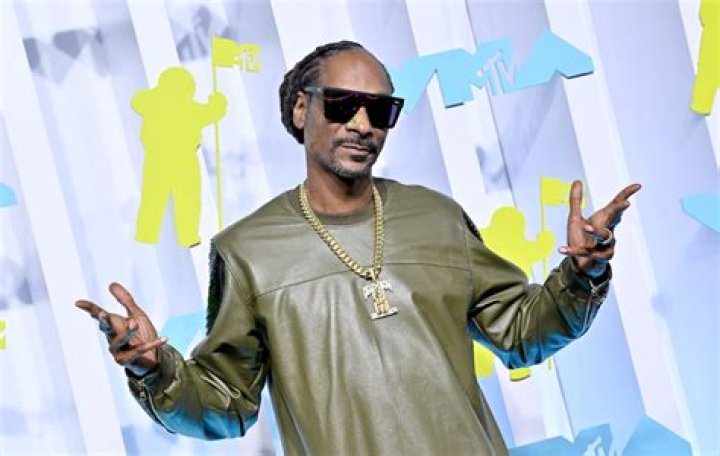 Glimpse at Snoop Dogg's 3 Tattoos &mdash; Touching Meanings behind 2 of Them