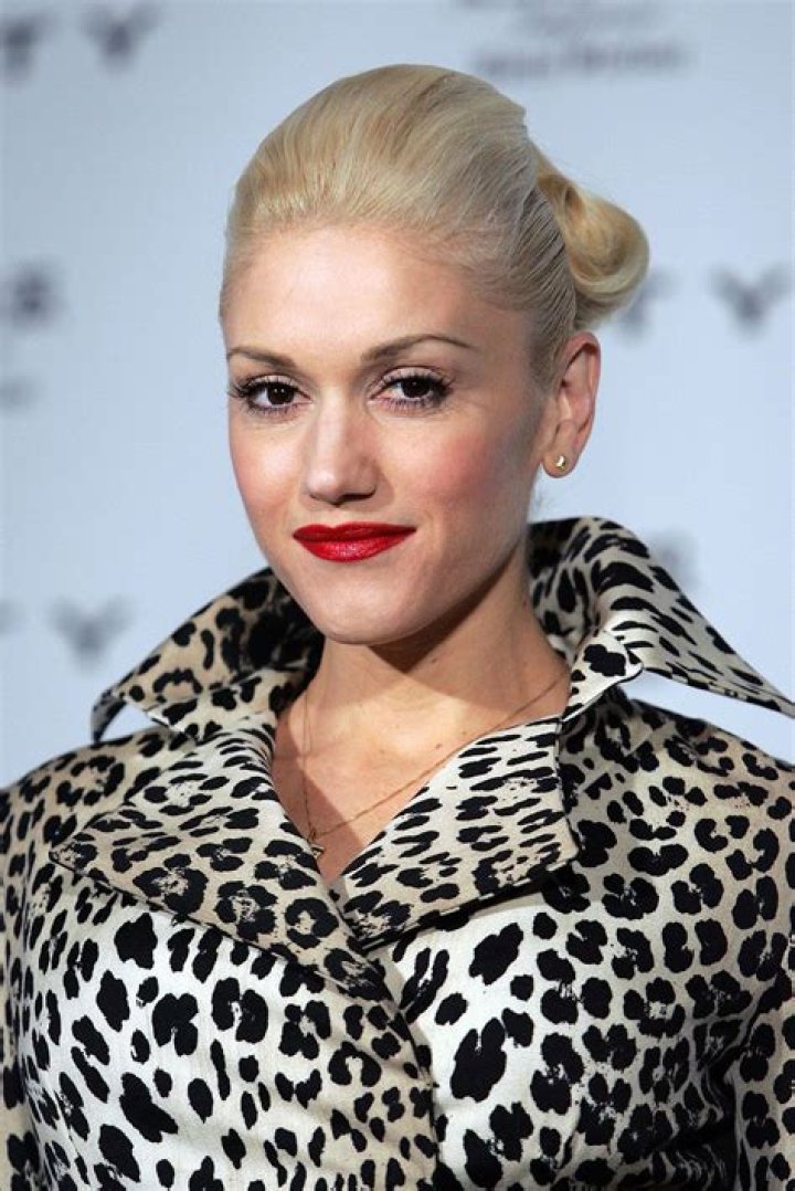 Gwen Stefani is more by the day as her baby bump swells Gwen
