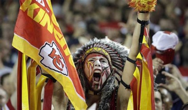 Kansas City Chiefs Fan and raiders cheerleaders