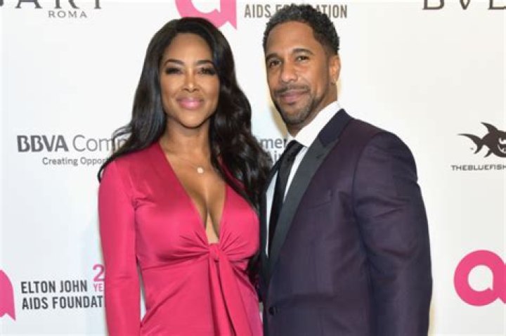 Kenya Moore Age, Husband, Net worth, Height, Weight, Bio 4 Kenya Moore with her husband Marc Daly