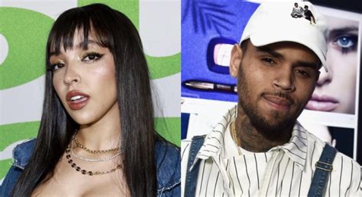 Neighbor says she heard Chris Brown beating Karrueche Tran Daily Mail