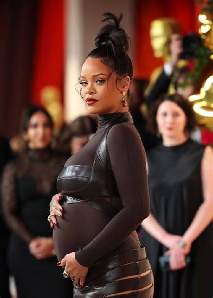Pregnant Rihanna's fans think she teased baby's gender as she revealed