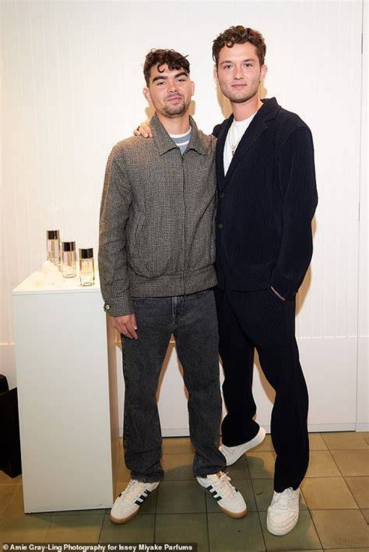 Rafferty Law, 22, and Sadie Frost's son Finlay Munro Kemp, 28, hang out
