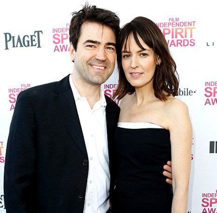 Ron Livingston and Rosemarie DeWitt bond with their daughter Gracie