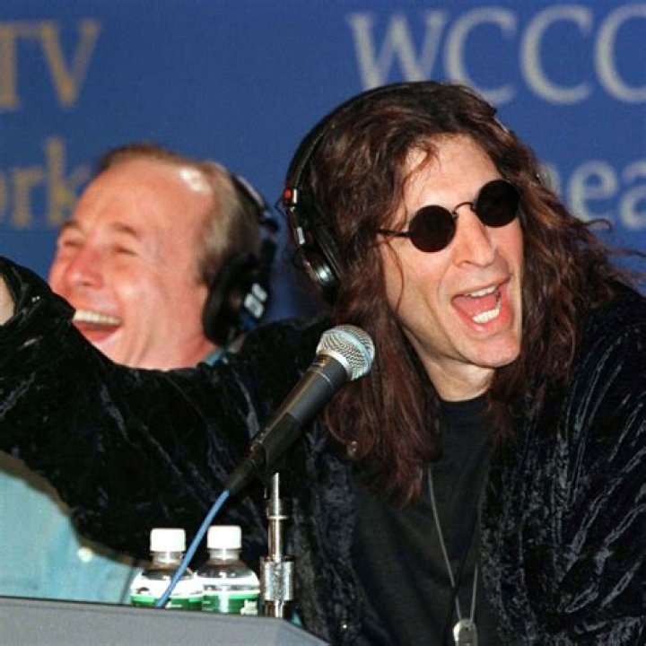 US radio anchorman Howard Stern poses with models 12 May on the beach