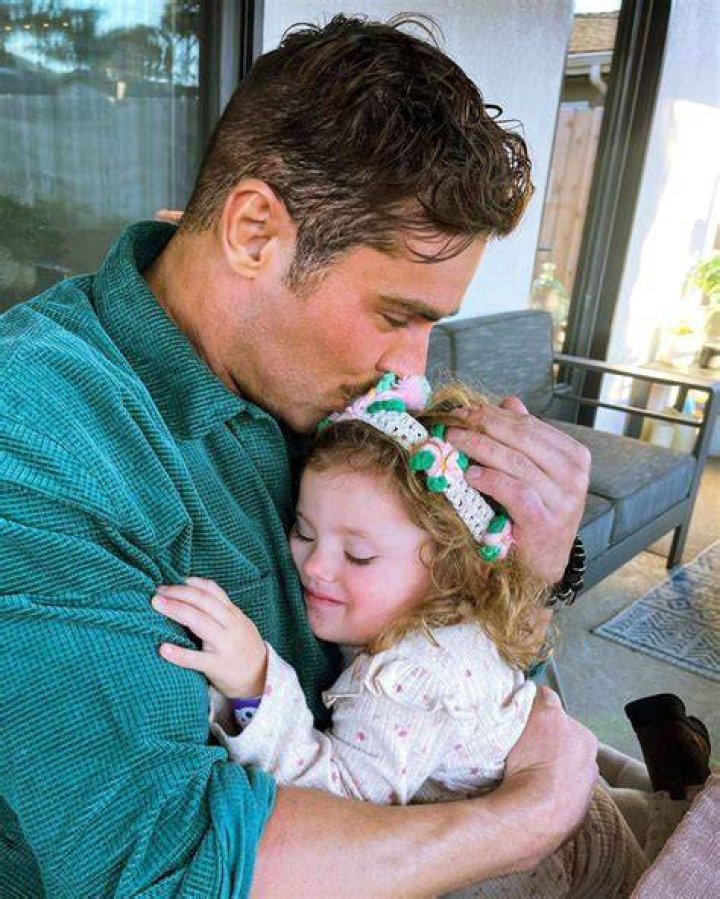 Zac Efron Cuddles Up With Baby Sister Olivia on Her Birthday Photo