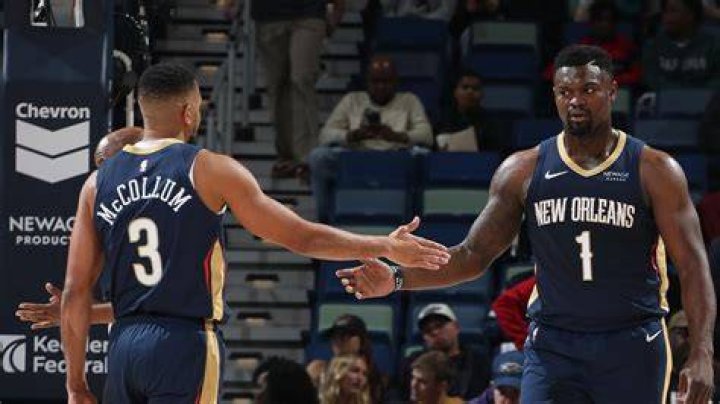 Zion Williamson celebrates with C.J. McCollum